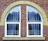 SeceuroGuard 1001 installed behind arched window